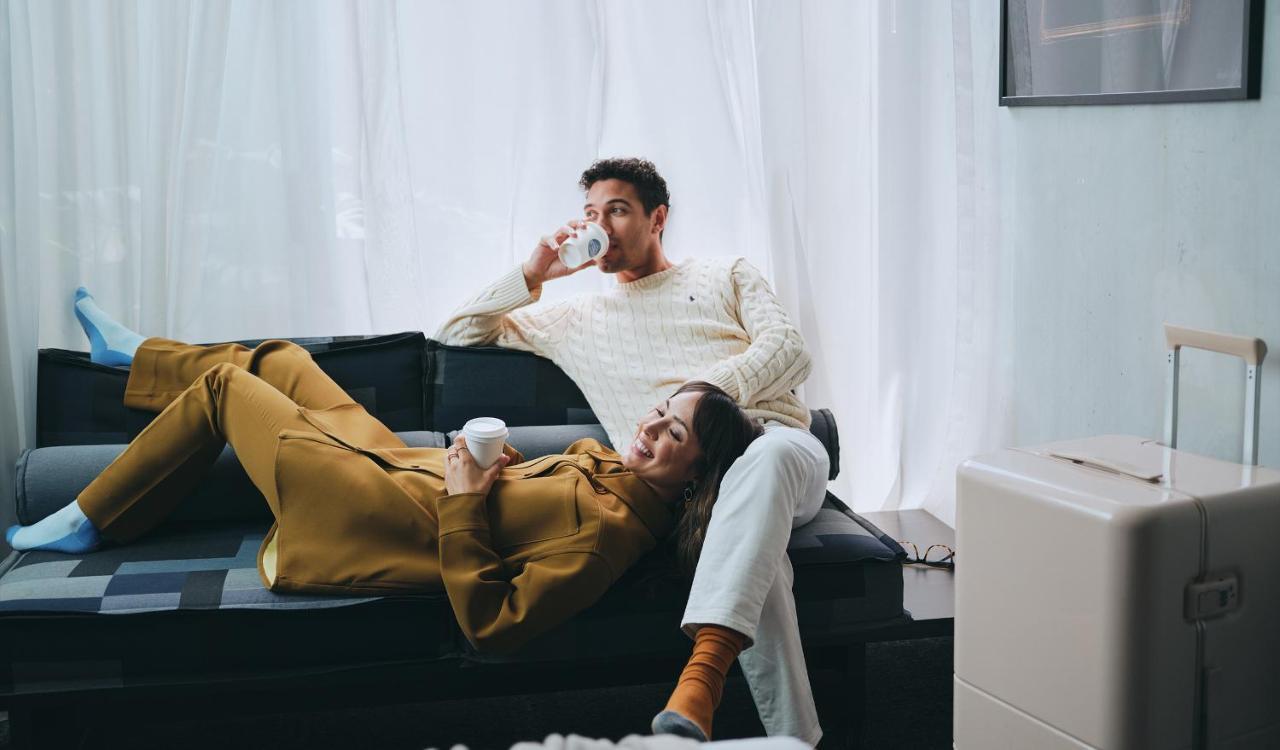 Lancemore Crossley St. Melbourne Buitenkant foto A couple relaxing at home